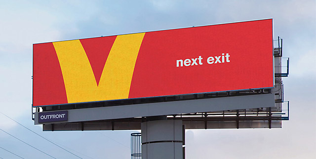 directional billboard mcdonalds next exit